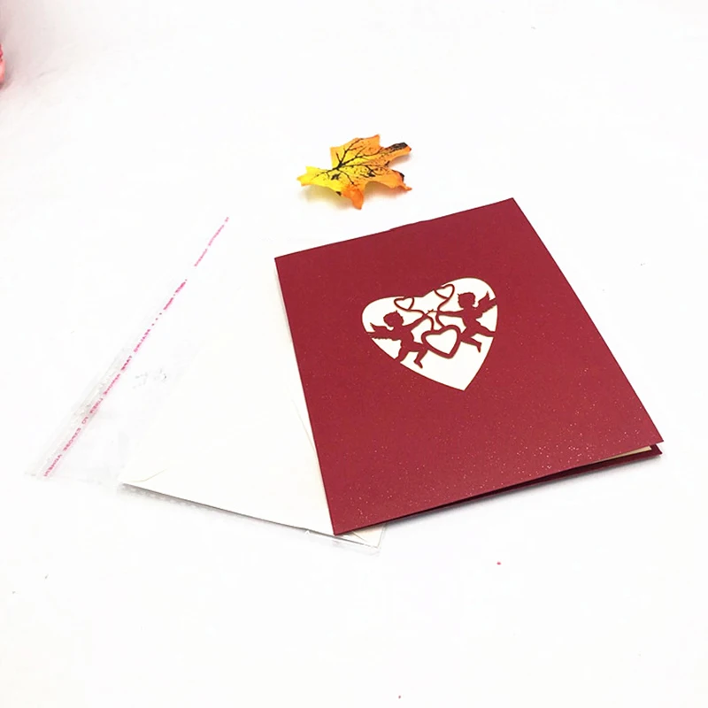 1pcs pjovimas Lazeriu 3D Pop-Up atvirukas Kupidonas Širdies Su Paketas, Kvietimas, Atvirukas, Skirtas Valentino Diena, Vestuvės Apdaila
